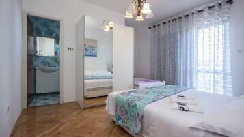 Apartment (Three Bedroom Apartment) | Desk, iron/ironing board, free WiFi, bed sheets