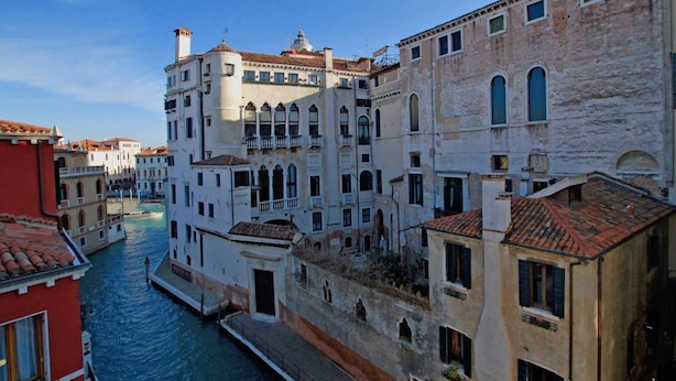 A canal in Venice with buildings on both sides.