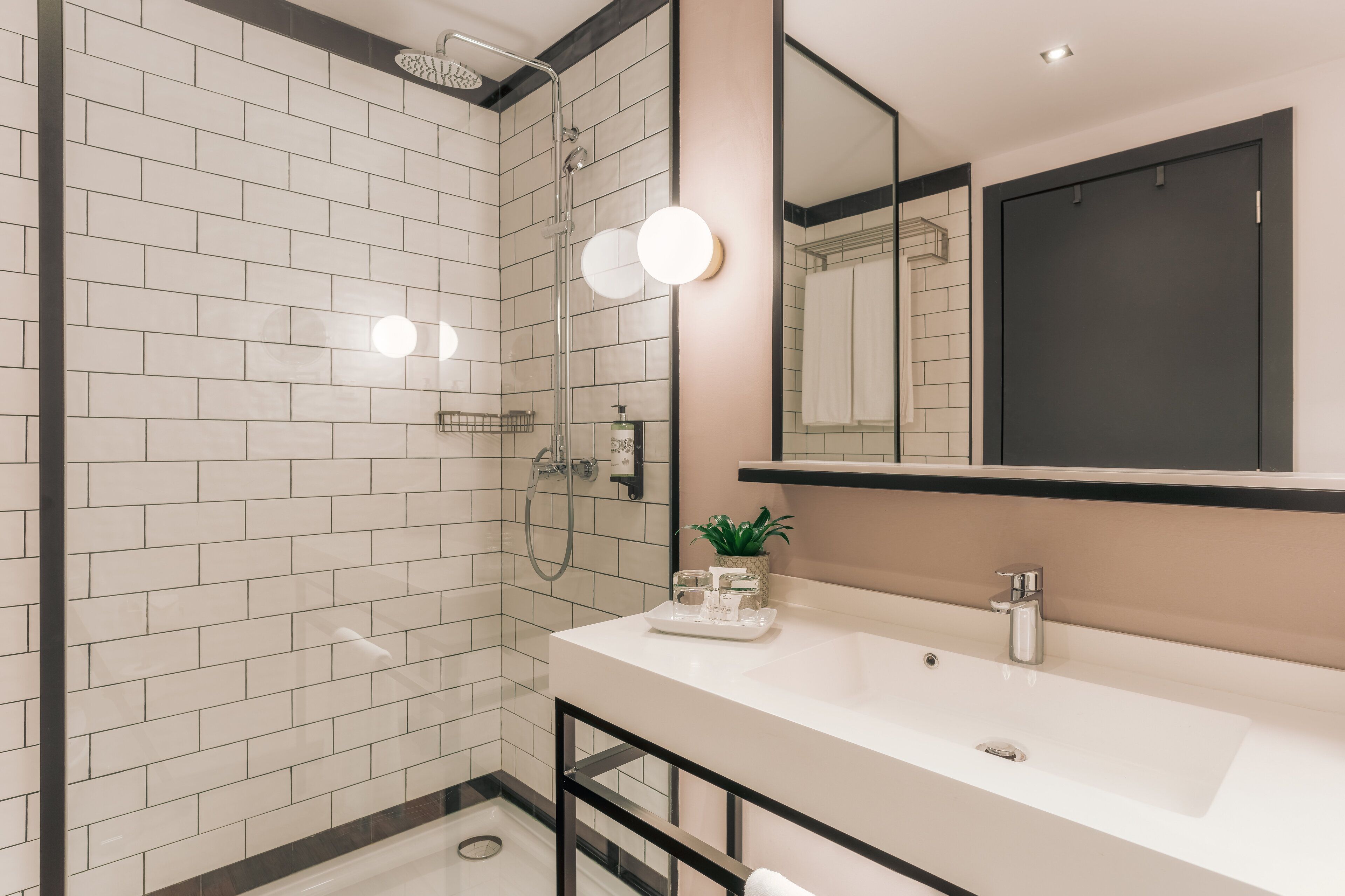 shower, designer toiletries, hair dryer, towels