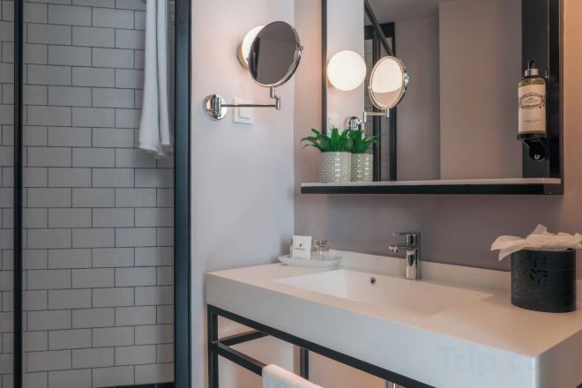 Bathroom | Shower, designer toiletries, hair dryer, towels