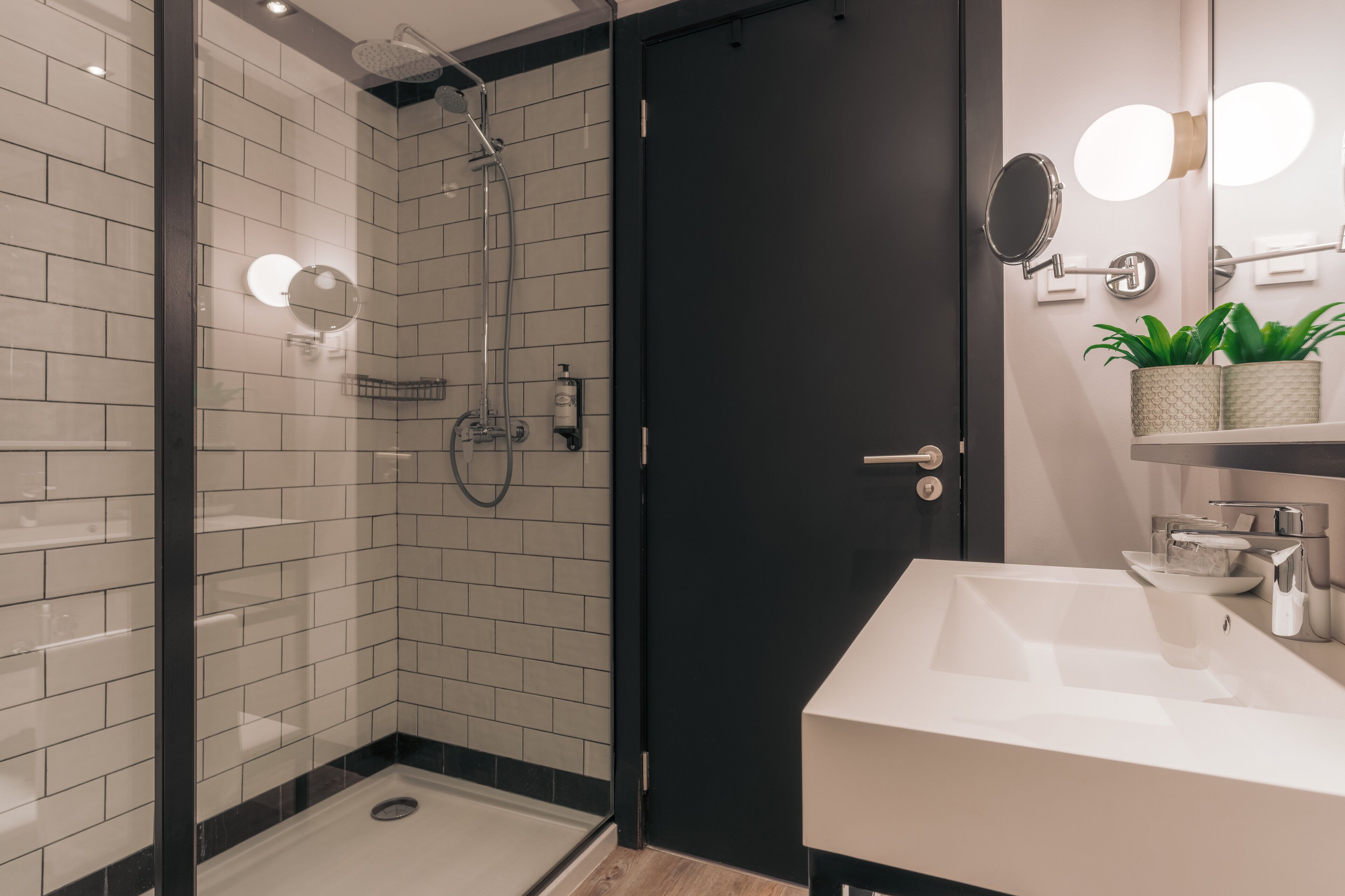 shower, designer toiletries, hair dryer, towels