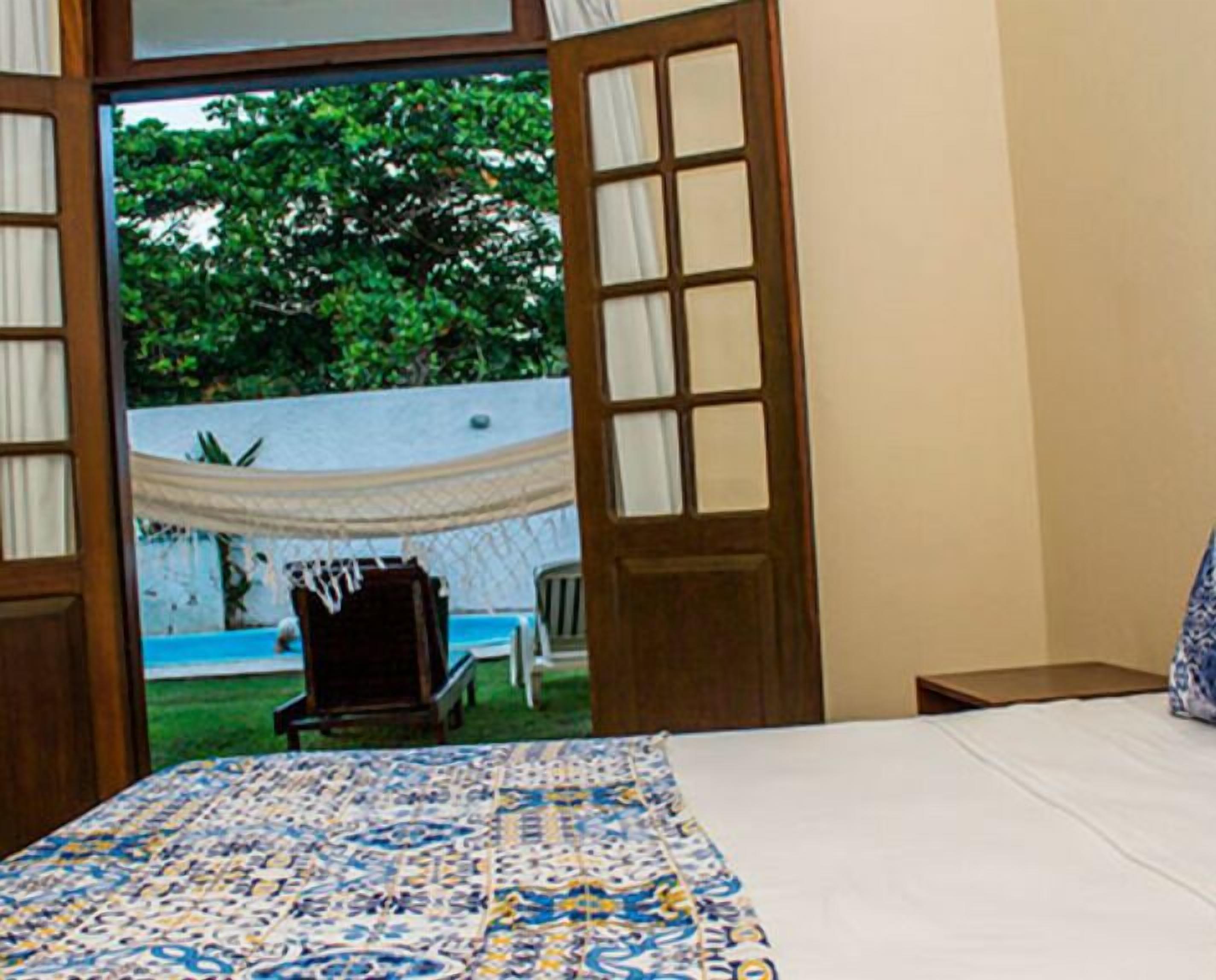 Quarto standard, 1 cama de casal | Frigobar, ferros/tábuas de passar roupa, roupa de cama