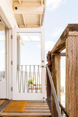 Step out onto the balcony and enjoy the view from this outdoor space.