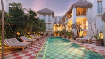 Outdoor pool, open 8:00 AM to 8:00 PM, pool umbrellas, pool loungers