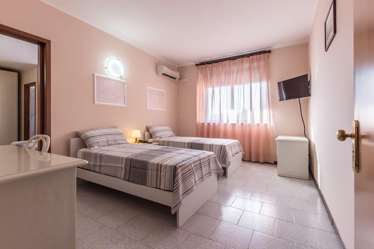 Quadruple Room, Balcony | Hypo-allergenic bedding, pillowtop beds, minibar, desk