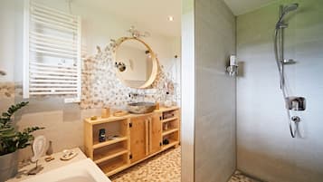 Bathtub, hair dryer, towels, soap