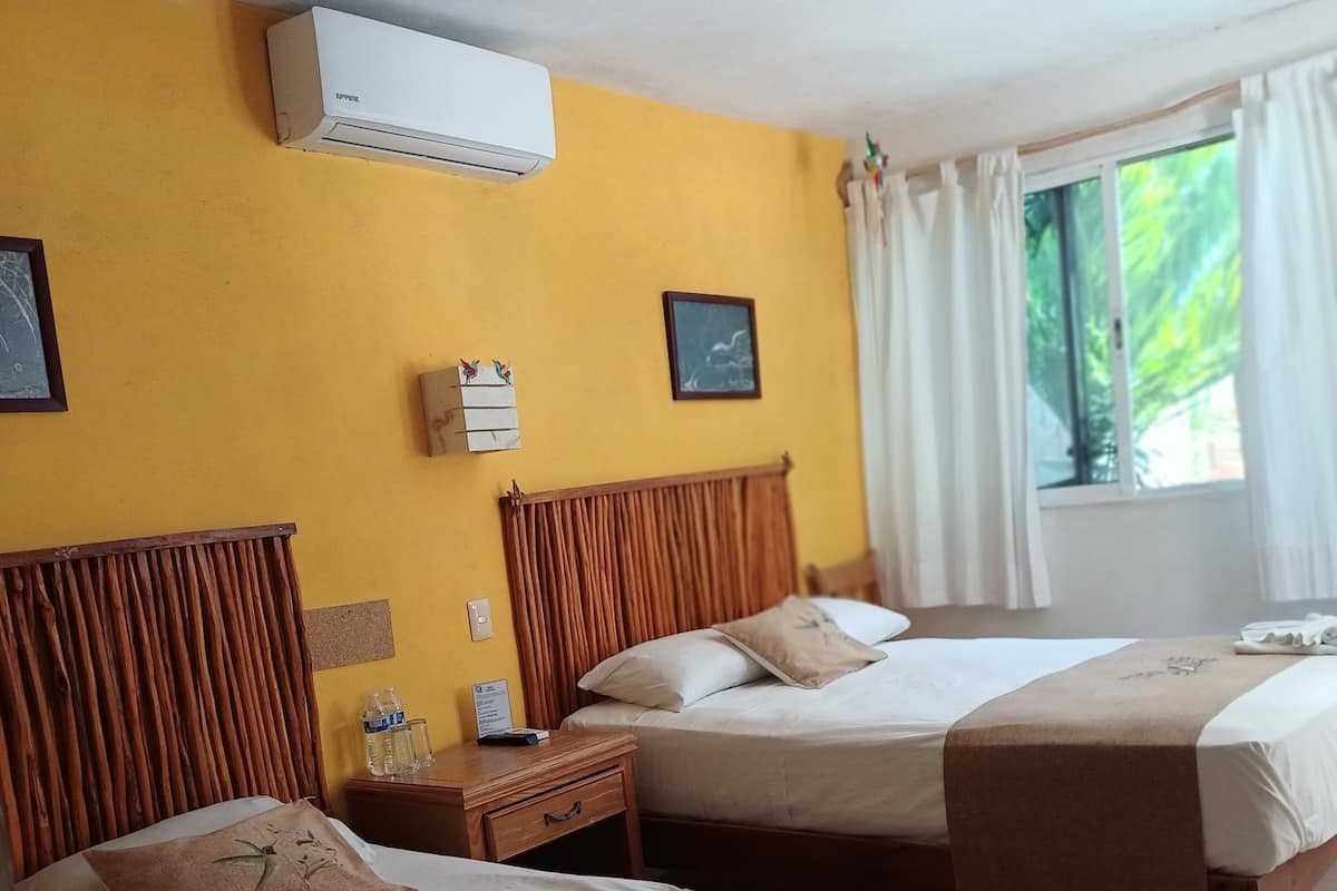 Honeymoon Double Room | Down comforters, individually furnished, iron/ironing board, free WiFi