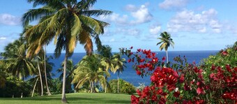 Garden Cottage with sweeping lawn view to the Caribbean Sea and islands
