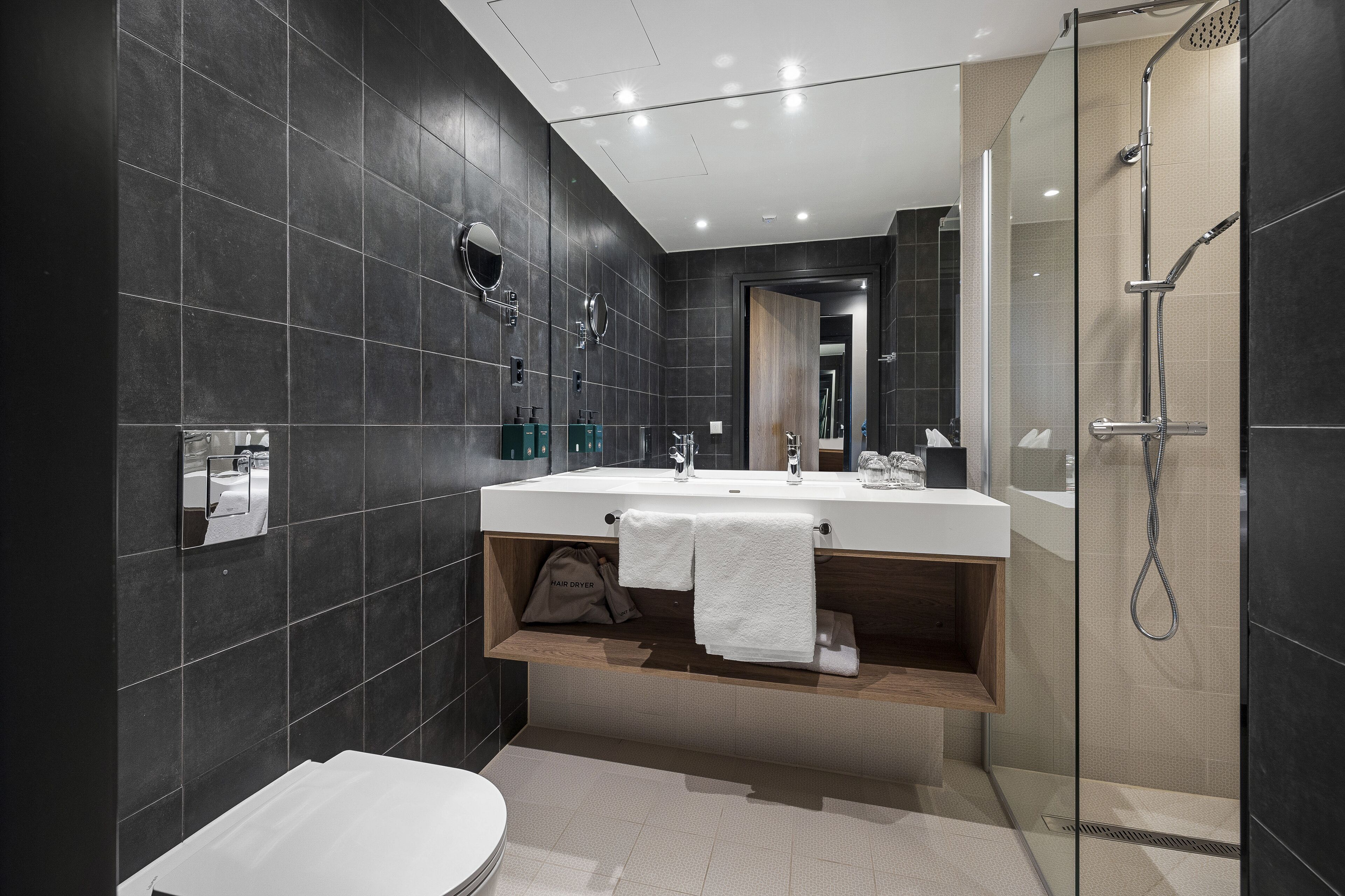 family room | bathroom | shower, hair dryer, heated floors, towels