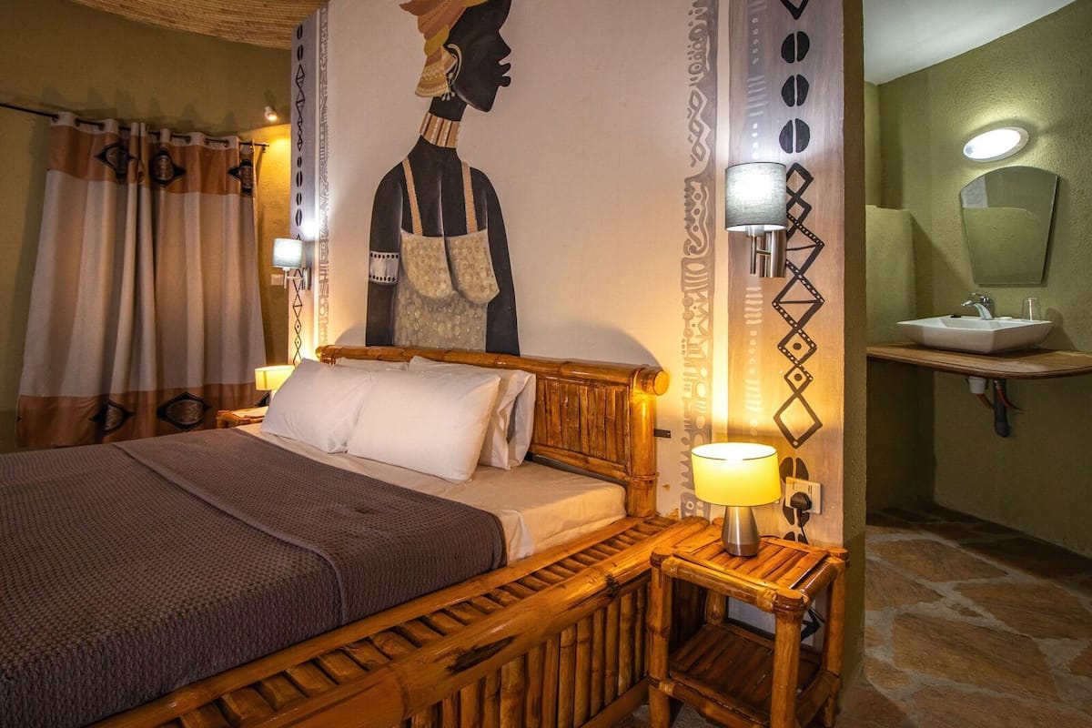 economy double room, pool view | in-room safe, individually decorated, individually furnished