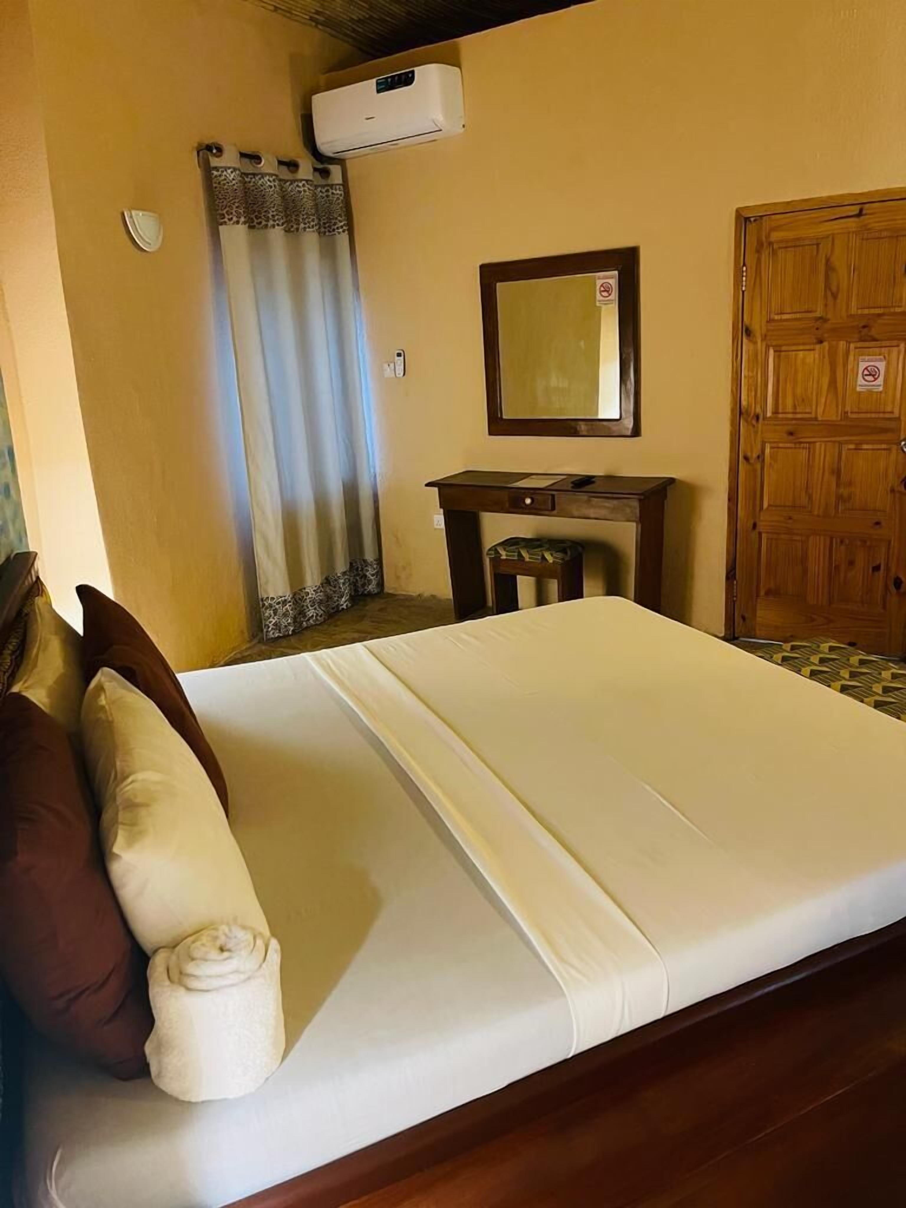 economy double room, pool view | in-room safe, individually decorated, individually furnished