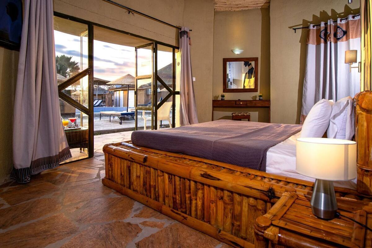 economy double room, pool view | view from room