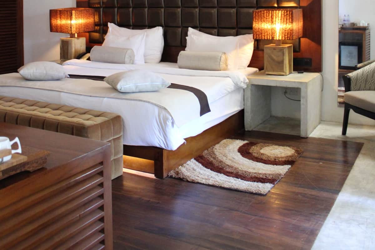 Premium bedding, memory-foam beds, minibar, in-room safe