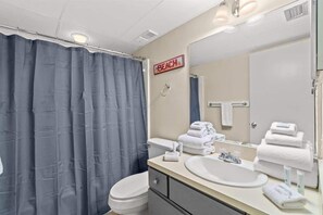 Bathtub, hair dryer, shampoo