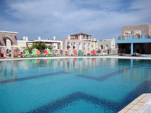 Dionysos Dorf Sonnenuntergang Resort