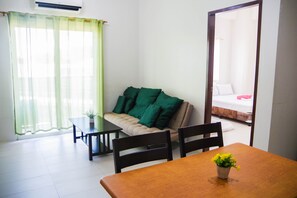 Standard Room | Living area | Flat-screen TV - Spianada Residences (Cebu City)