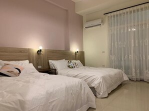 Quadruple Room, Balcony | Select Comfort beds, in-room safe, individually decorated