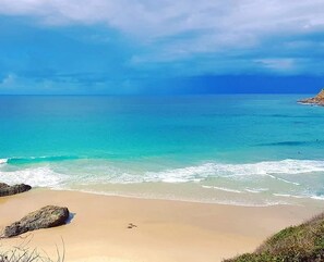 Beach nearby, sun loungers