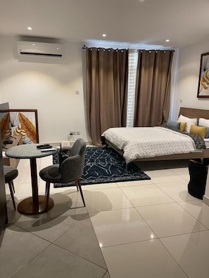 Economy Room | Living area | LCD TV - Haven City at the Gallery (Accra)