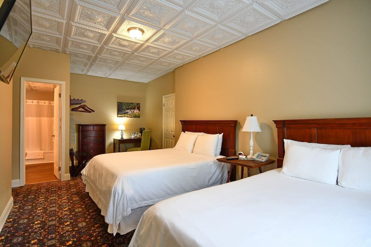 Chambre double, 2 grands lits | Rideaux d’obscurcissement, fer et planche à repasser
