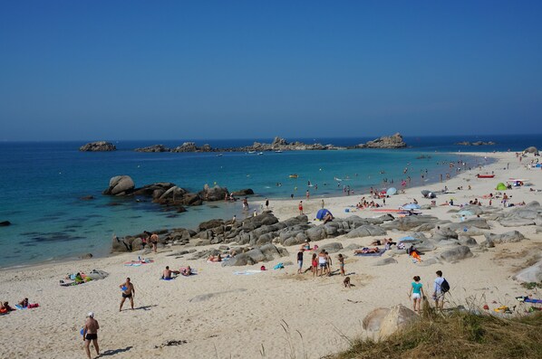 On the beach, sun loungers, beach towels