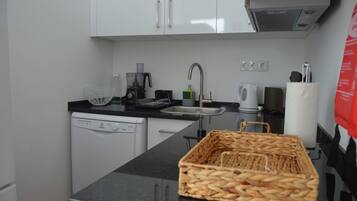 Mini-fridge, microwave, oven, stovetop