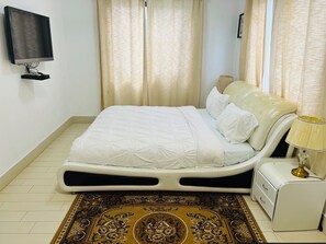 Business Apartment, 1 Bedroom, Sea View | 1 bedroom, desk, laptop workspace, iron/ironing board
