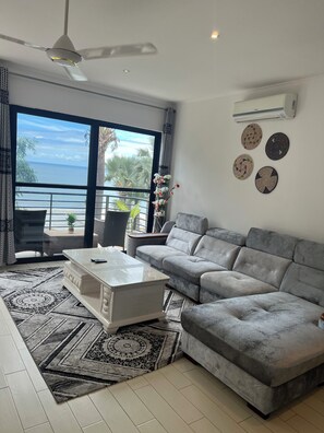 Family Apartment, 3 Bedrooms | Living area | TV