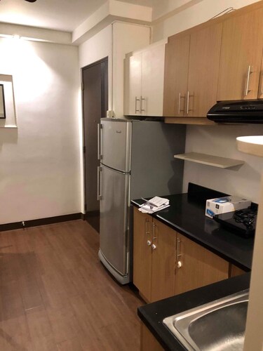 1 Bedroom Fully Furnished Mid-rise Condominium with a City View.