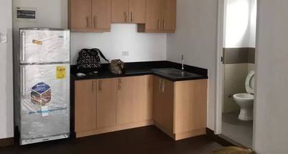 1 Bedroom Fully Furnished Mid-rise Condominium with a City View.