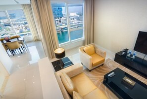 Deluxe Apartment, 2 Bedrooms (2) | Living room | LCD TV