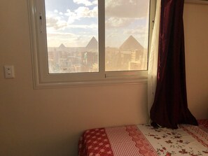 Apartment, 3 Bedrooms | Iron/ironing board, free WiFi, bed sheets - Magic Pyramids View Accommodation (Giza)