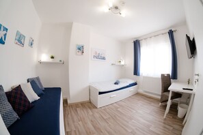 4 habitaciones, tabla de planchar con plancha, wifi y ropa de cama