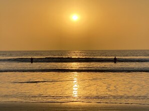 On the beach, sun-loungers, beach towels