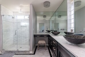 Combined shower/tub, hair dryer, towels, soap