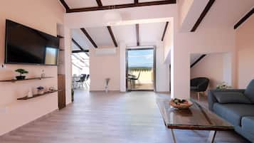 Appartamento, 2 camere da letto, vista mare (Penthouse) | Soggiorno | TV a schermo piatto