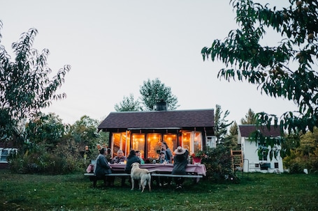 Outdoor dining. Camp Lillian Gorgeous New Cabin with Mountain Views