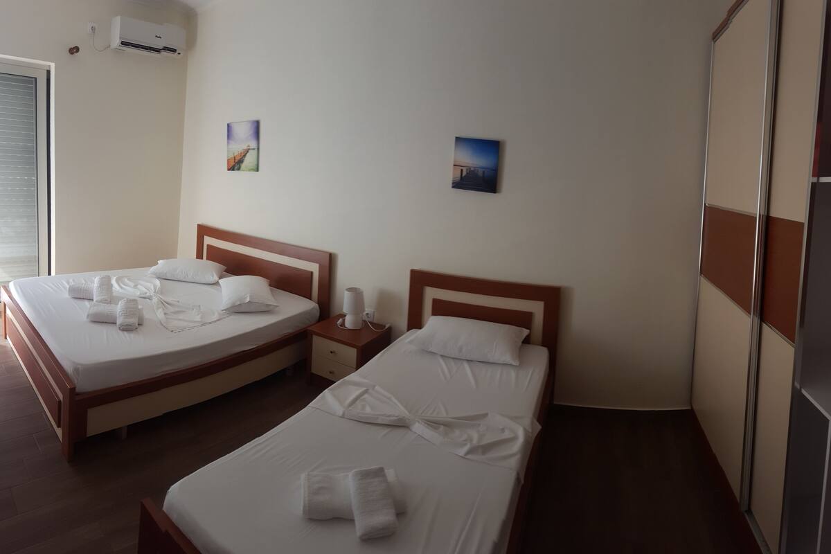 Quadruple Room | Minibar, in-room safe, WiFi (free), individually furnished