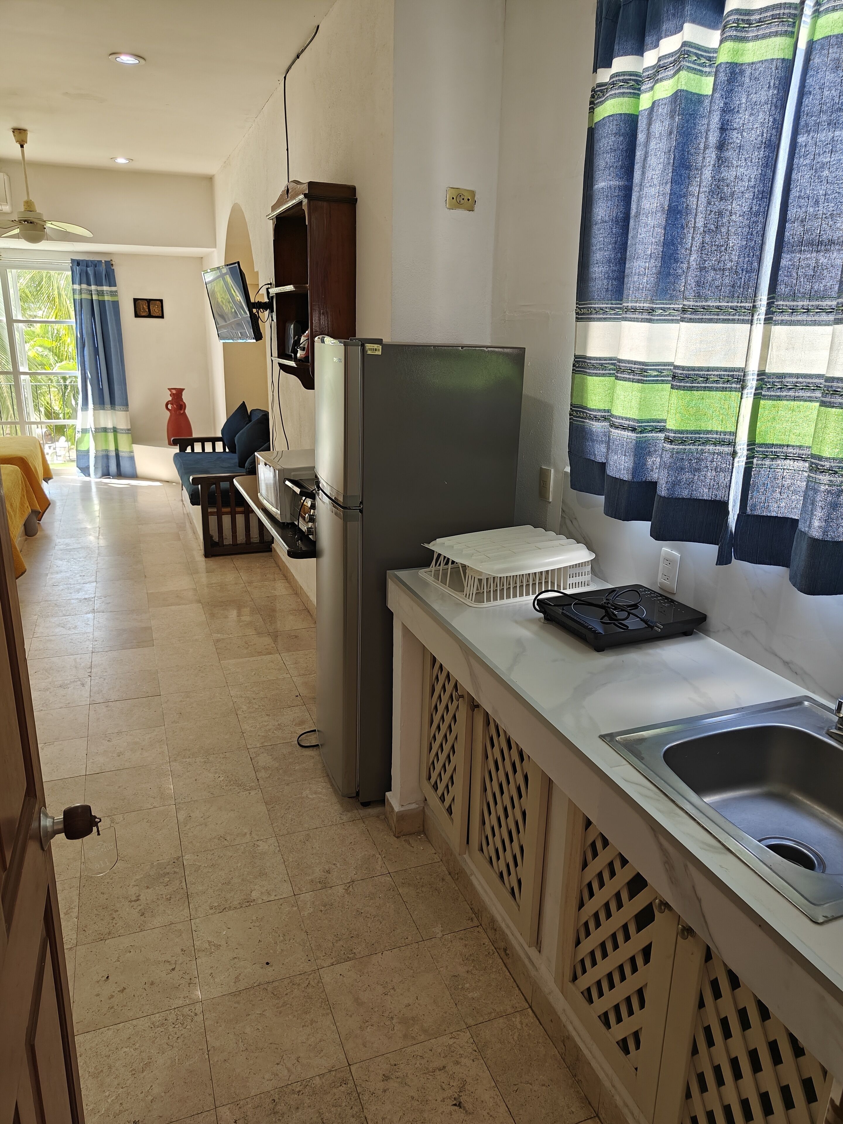 economy apartment | private kitchen | oven, griddle, cleaning supplies