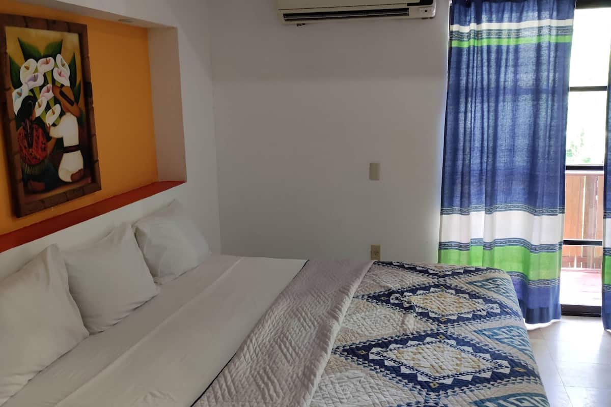 Economy Apartment | 2 bedrooms, in-room safe, iron/ironing board, free WiFi
