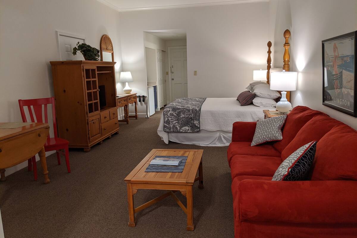 family room, multiple beds, garden view, garden area | living area | 43-inch flat-screen tv with cable channels, tv