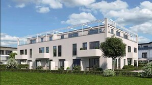 A modern two-story building with a flat roof and large windows. - HAIMHAUSERS Hotel Garni (Haimhausen)