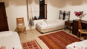 Desk, blackout curtains, bed sheets