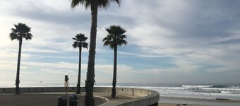 Walk to the beach & Downtown! Family Size Condo! Two-car garage! Host By Owner!