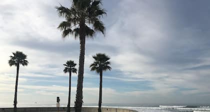 Host By Owner! Family Size Condo! Walk to the Beach & Downtown! Two-car garage!