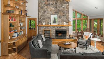 Flat-screen TV, fireplace, video-game console, DVD player