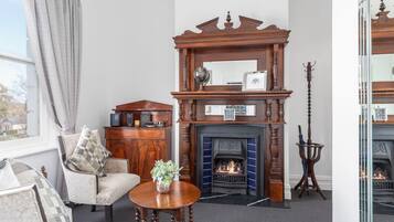 Hay Suite | Living area | 50-inch Smart TV with satellite channels, TV, MP3 dock