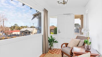 Frew Suite | Living area | 50-inch Smart TV with satellite channels, TV, MP3 dock