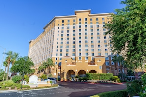 Stunning hotel with a grand entrance and beautifully manicured grounds.