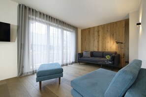 Apartamento (Obergeschoss) | Sala de estar | Televisión de pantalla plana de 40 pulgadas con canales por satélite